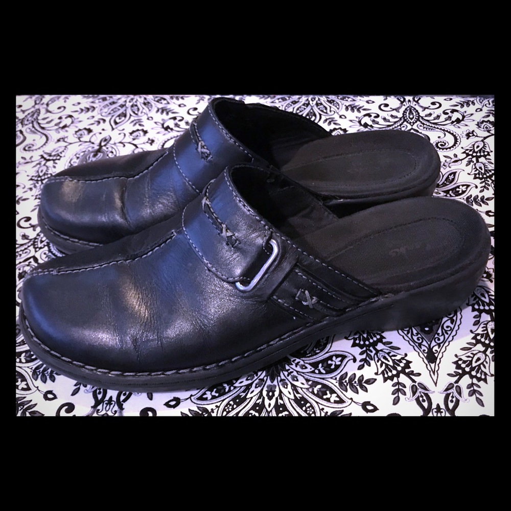 Clark’s black leather slip on mules
